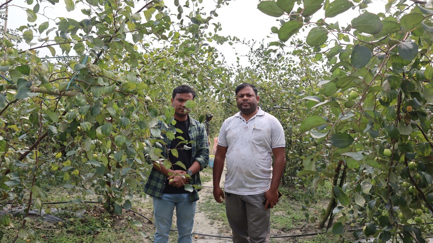 Pankaj Khanikar and Akbar ali ahmed in berry farm